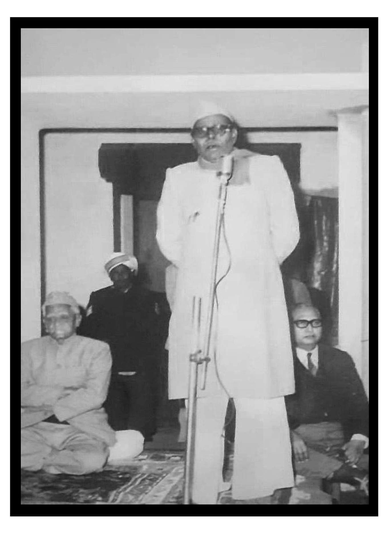 Addressing a gathering with Shri Akbar Ali Khan